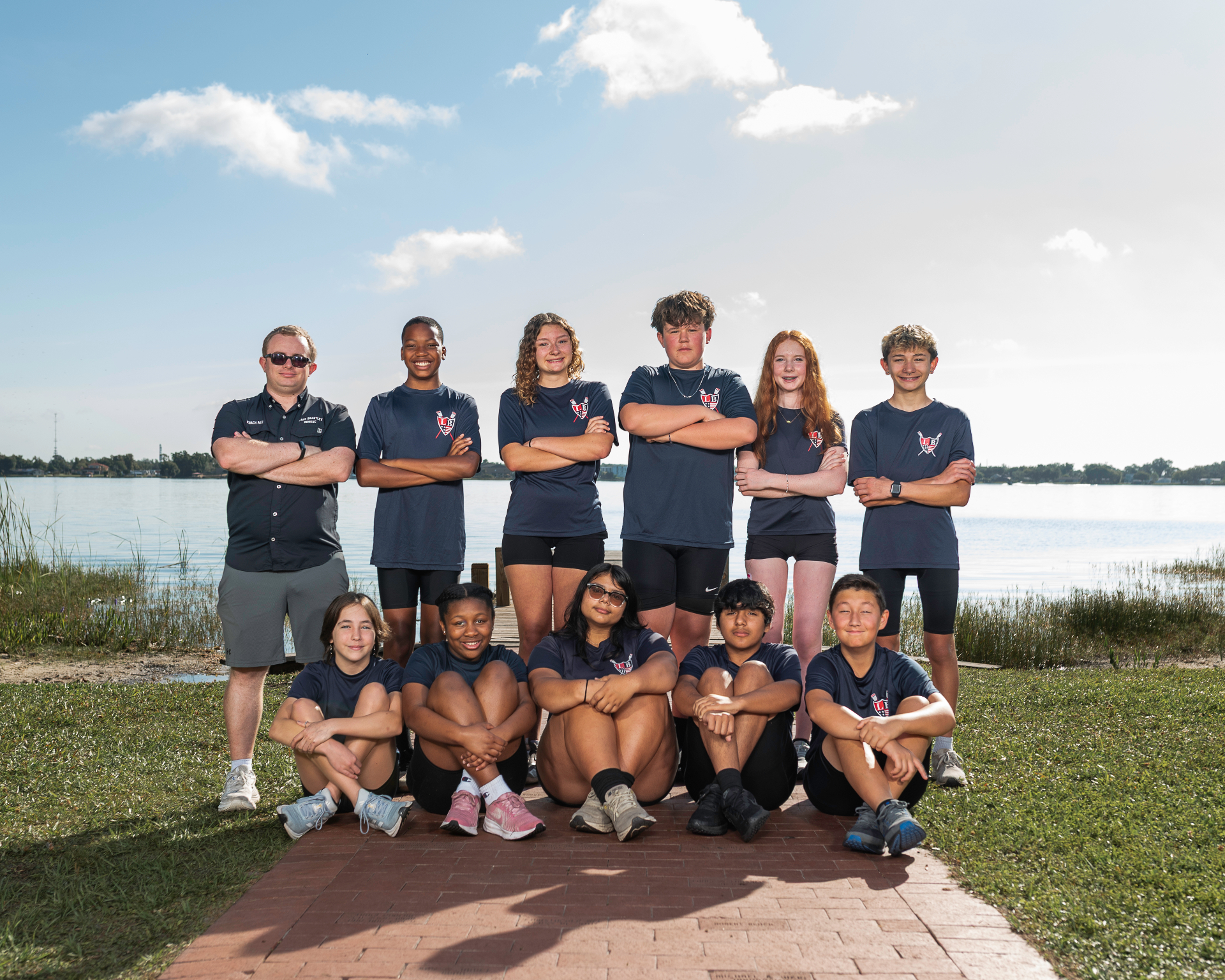 LBRA elementary and middle school team with their coach on Lake Fairview